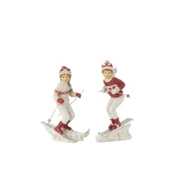 Lot fille et garçon sur ski en poly blanc 13x8x16cm