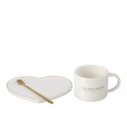 Taza con platillo en forma de corazón y cuchara de porcelana blanca 18x14x6cm.