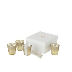 Caja de 4 velas perfumadas en vidrio champagne de 7x7x8 cm